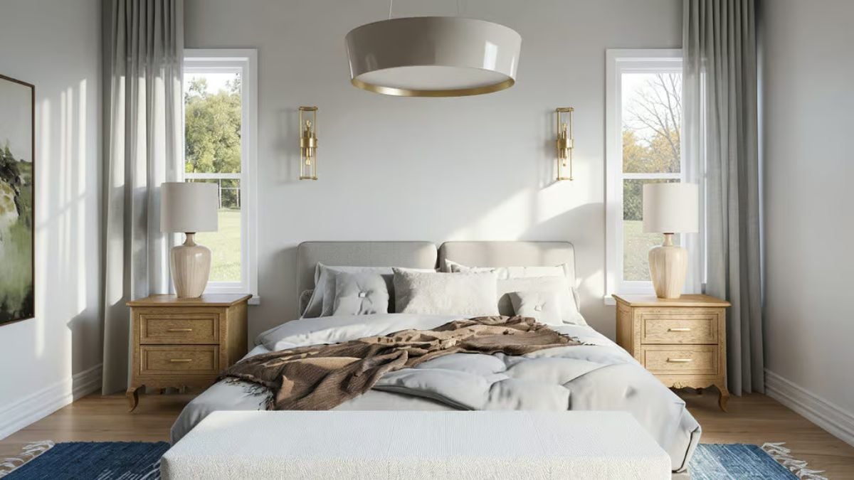 Layered Neutrals and Brass Sconces Give This Primary Bedroom Its Quiet Authority