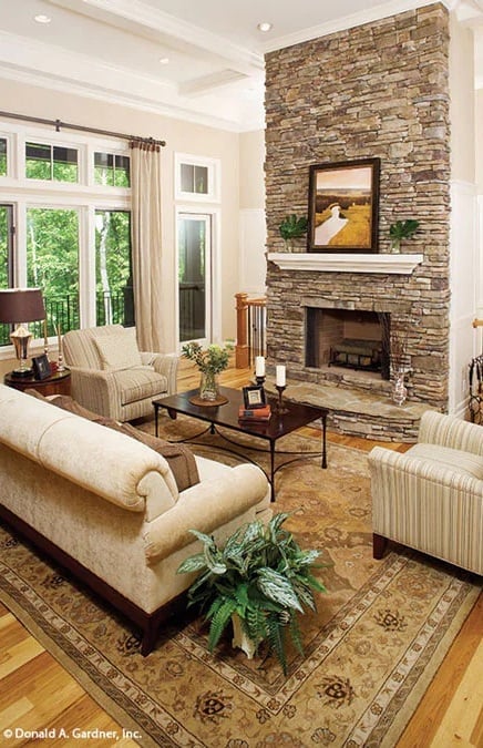 Stacked Stone Fireplace That Earns Every Inch of Ceiling Height