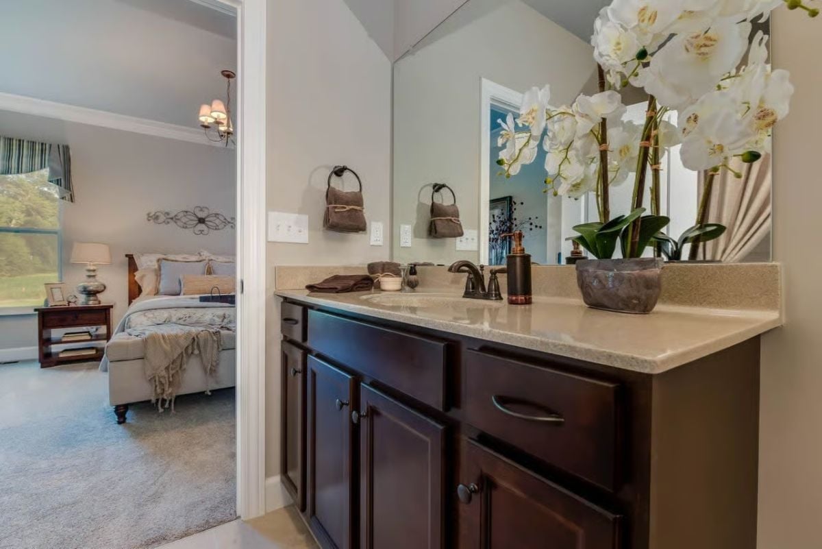 Dark Vanity, White Orchids, and an En Suite That Earns Its Keep