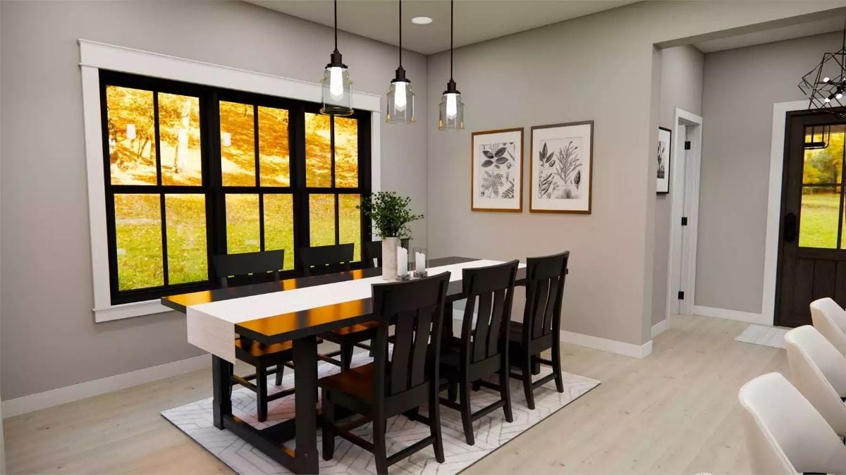 Pendant Lights Over a Dark Wood Table Make Autumn Feel Like It Lives Inside