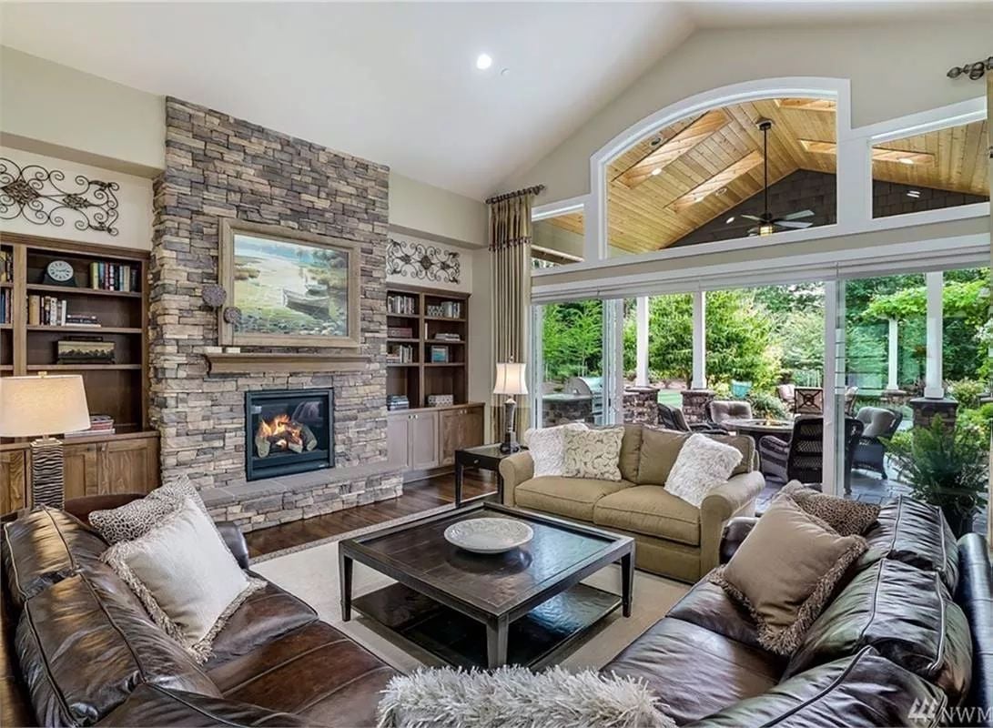 Stone Fireplace Wall Built Floor-to-Ceiling Earns Every Inch of Attention