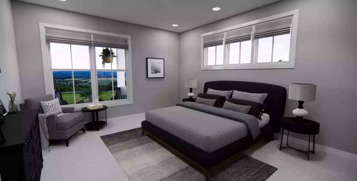 Charcoal Bed Frame, Gray Walls, and a Reading Nook That Pulls Its Weight