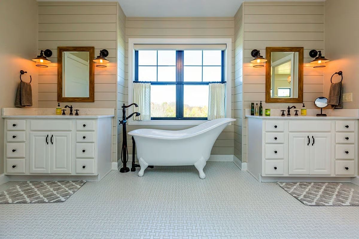 Clawfoot Tub Centered Between Dual Vanities Where Shiplap Does All the Heavy Lifting