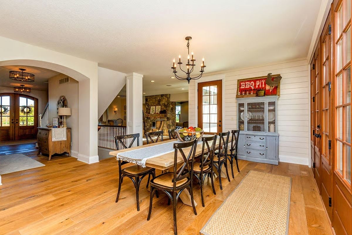 Farmhouse Dining Room Where Shiplap and a BBQ Pit Sign Set the Whole Tone
