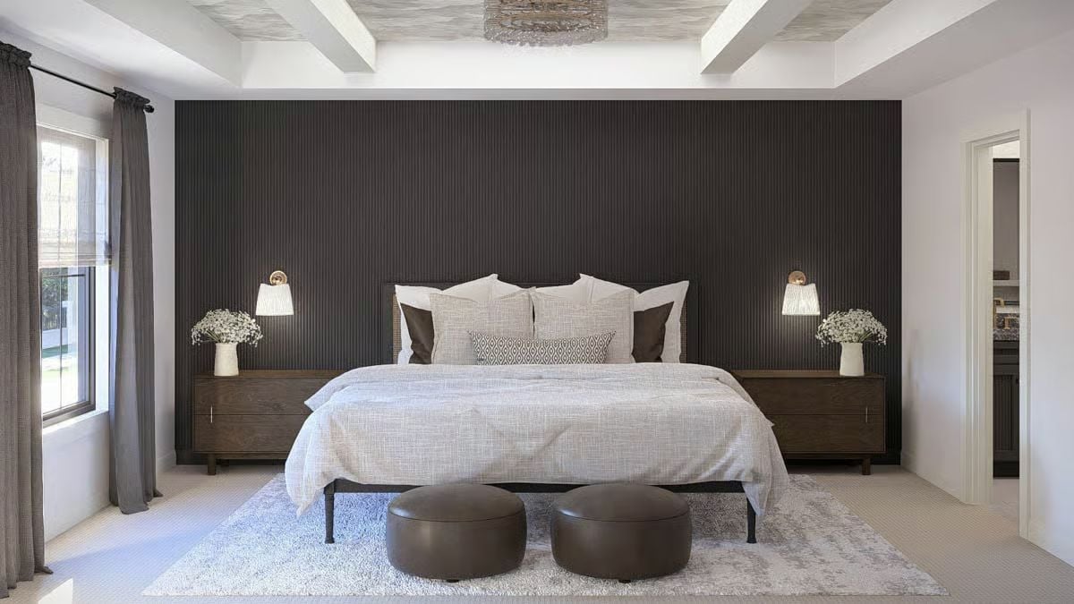 Dark Slat Wall, Two Ottomans, and a Bed That Means Business