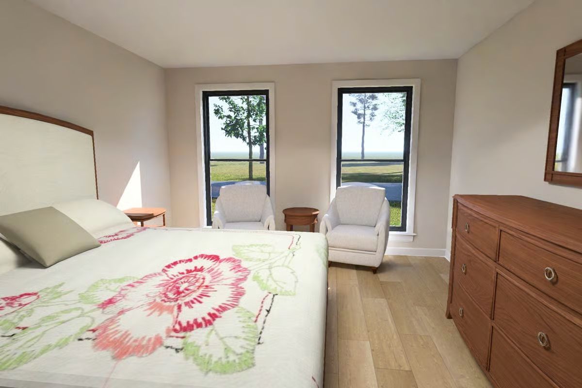 Floral Quilt and Paired Armchairs Turn a Bedroom Into Something You'd Actually Want to Stay In