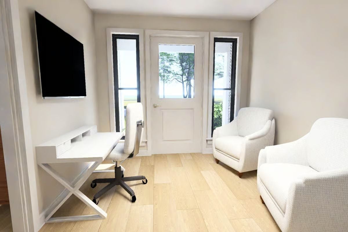 Mounted TV Above a Floating Desk Makes the In-Law Suite Pull Double Duty