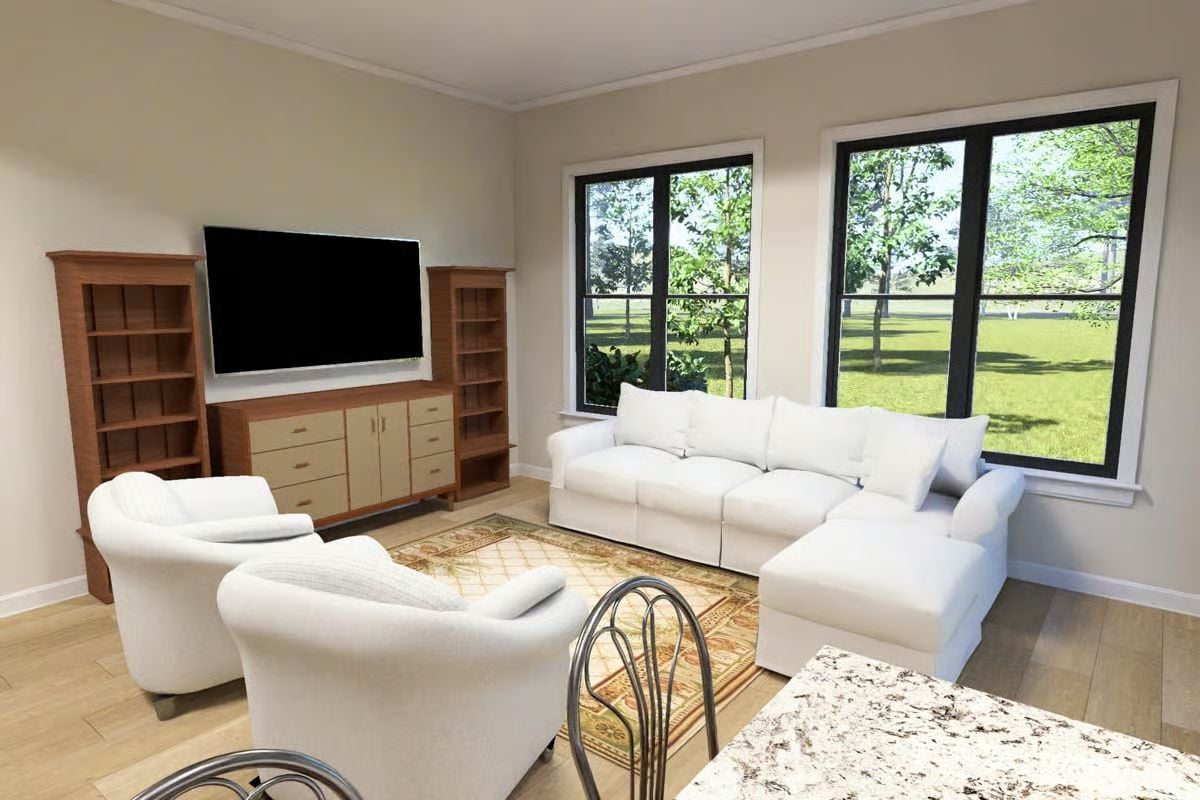 Slipcovered Sectional and Built-In Shelving Keep the Living Room Relaxed