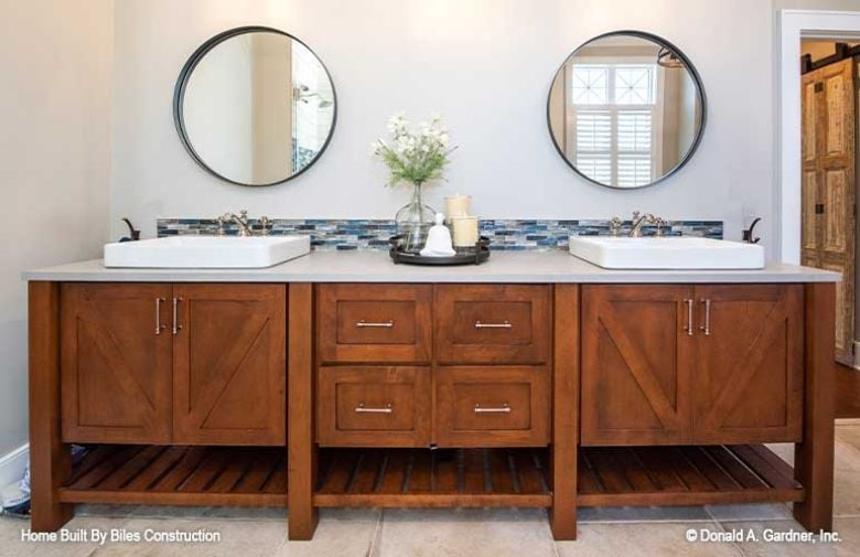 Barn-Door Cabinet Fronts and a Backsplash That Pulls the Whole Vanity Together