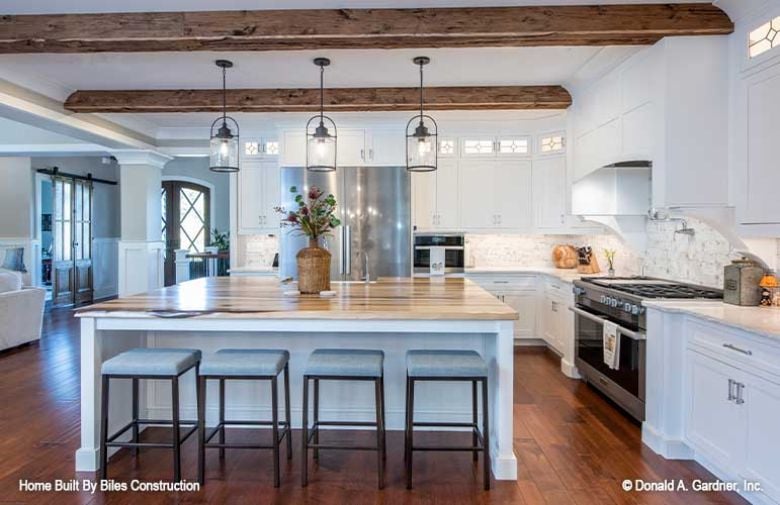 Butcher Block Island, Exposed Beams, and Pendants That Actually Fit the Space