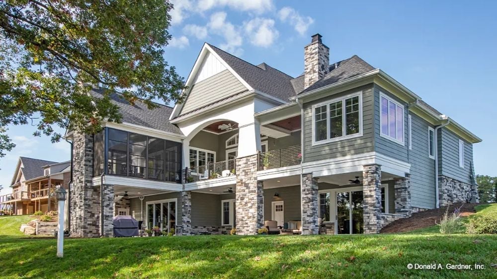 Stone Columns, Screened Porch, and a Backyard That Earns Its Square Footage