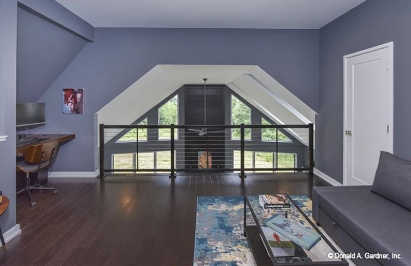 Loft Workspace with a Railing View That Does Double Duty