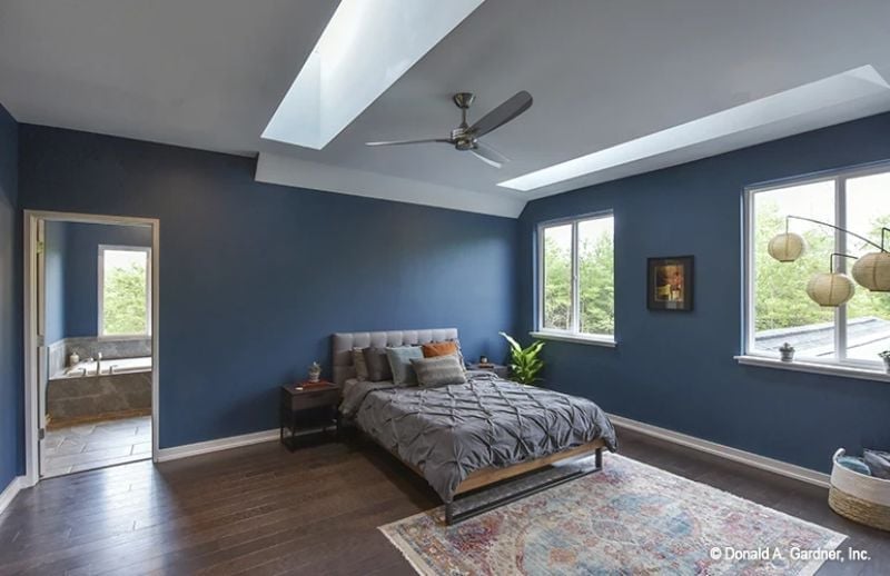 Slate Walls and a Tray Ceiling That Make a Bedroom Feel Like a Retreat