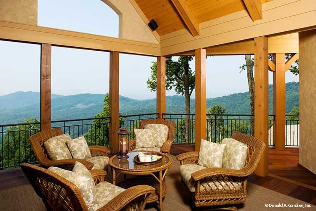 Wicker, Mountain Ridgelines, and a Covered Porch That Earns Every Square Foot