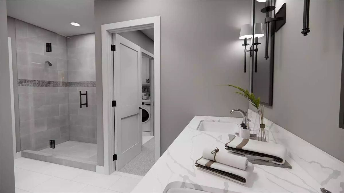Marble Counters, Matte Black Hardware, and a Door That Goes Straight to the Laundry Room