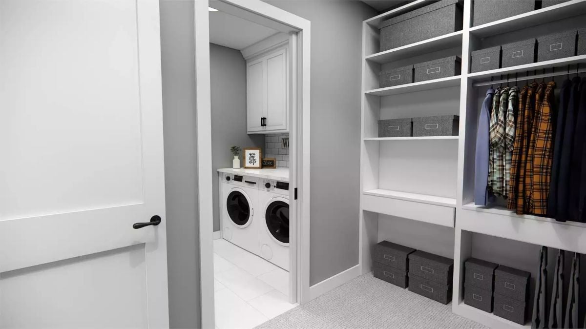 Walk-Through Closet With a Laundry Room Right on the Other Side of That Door