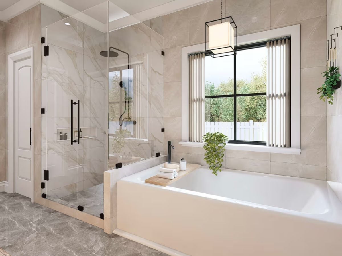 Marble Tile, a Glass Enclosure, and a Soaking Tub That Makes the Case for Both