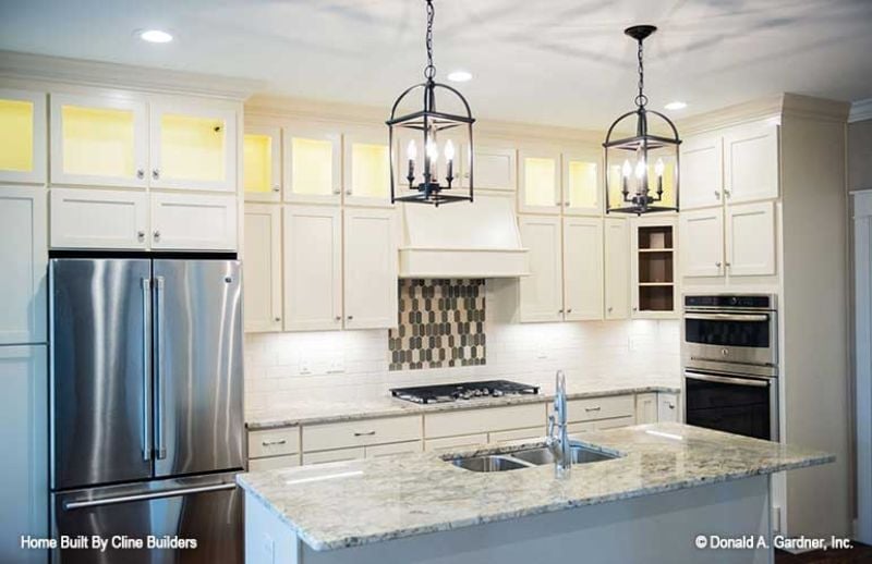 Granite, Lantern Light, and a Backsplash That Earns a Second Look