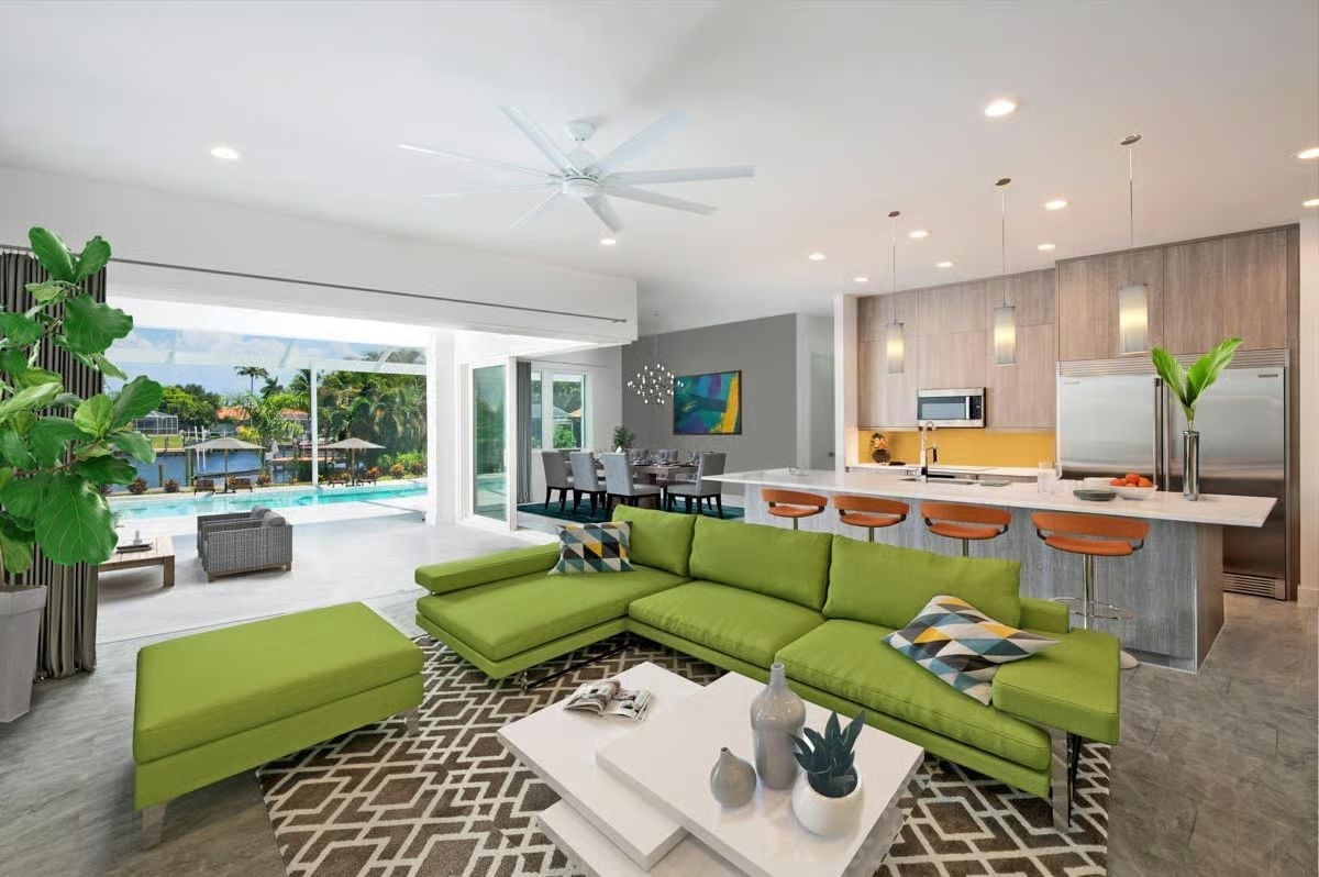 Chartreuse Sectional, Pool View, and an Open Kitchen That Earns Its Place