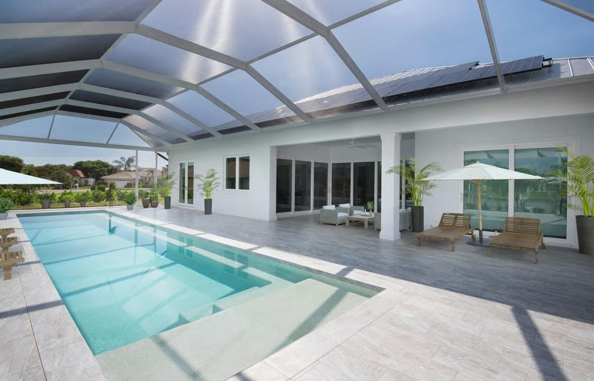 Screened Lanai With a Lap Pool That Makes Going Inside Feel Optional