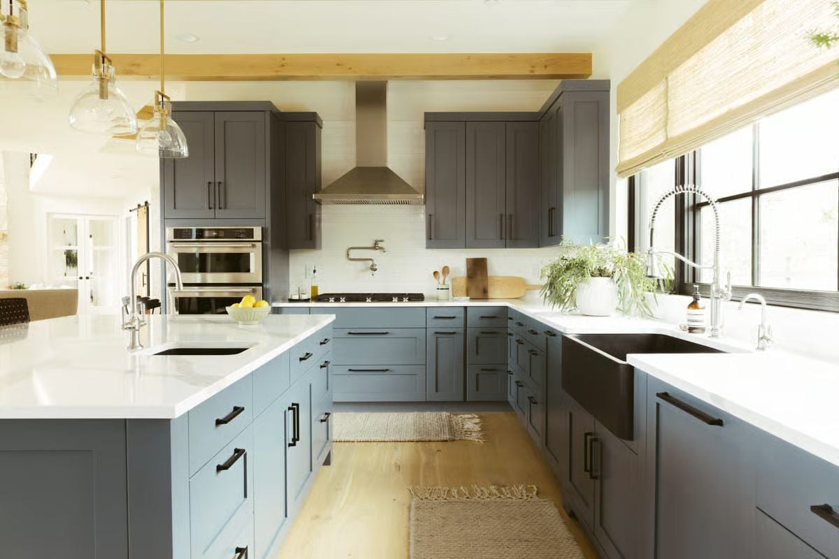 Blue-Gray Cabinetry and an Apron Sink Give This Kitchen Its Quiet Confidence