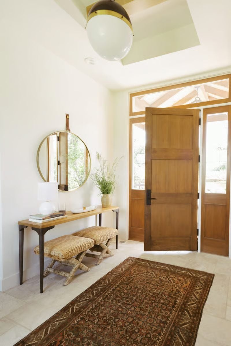 Warm Wood Tones and Natural Texture Set the Tone in This Entryway