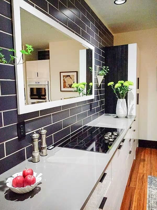 Induction Cooktop Flush in the Counter, Mirror Doubling the Whole Room