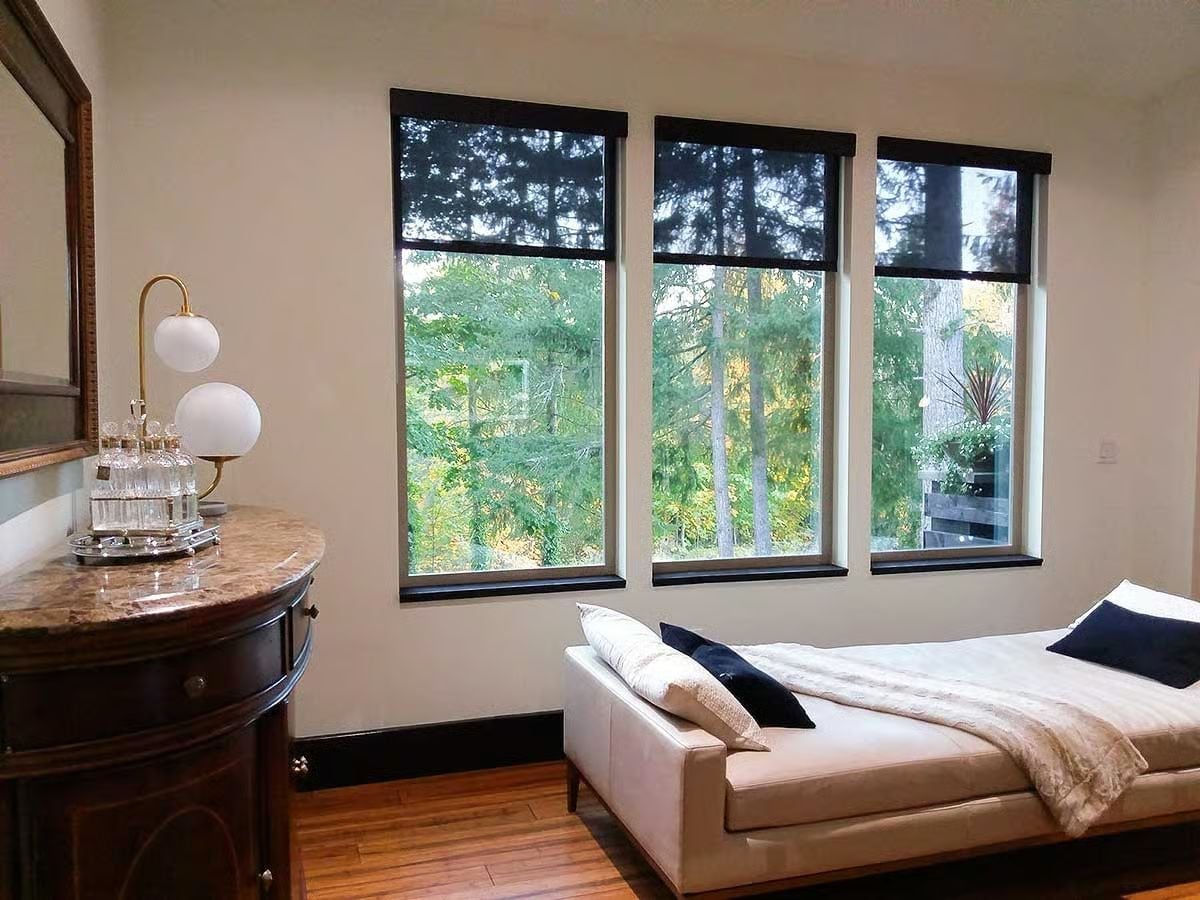 Marble-Top Dresser and Forest Views Split the Room's Loyalties Perfectly