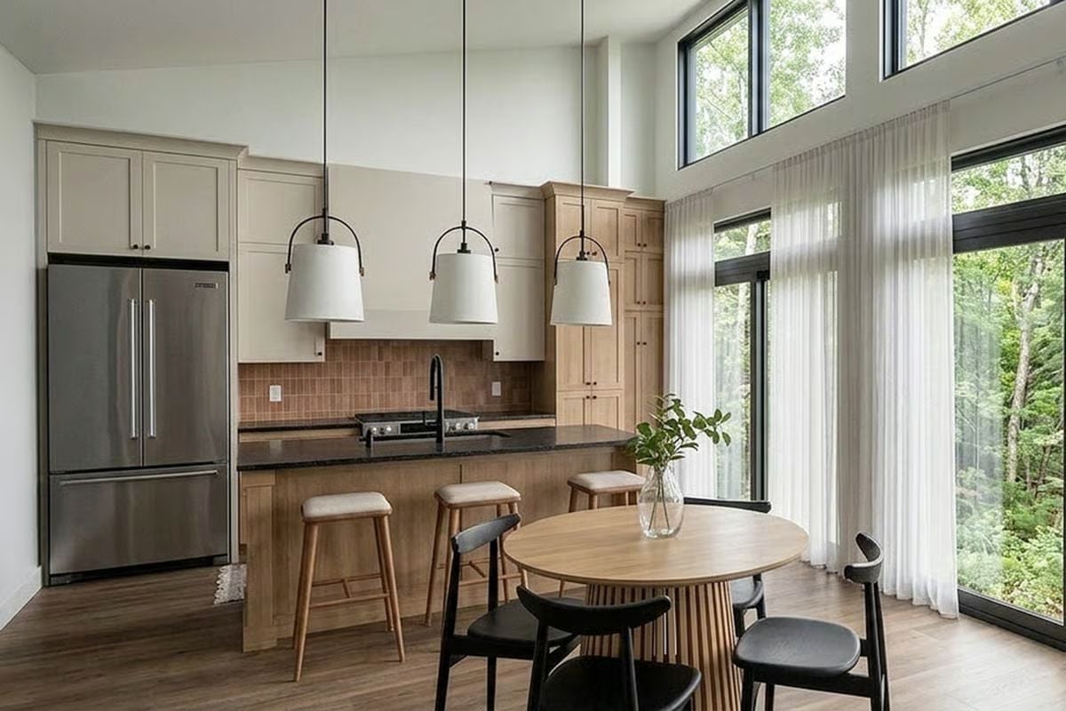 Pendant Lights Over a Kitchen Island Where the Forest Feels Close