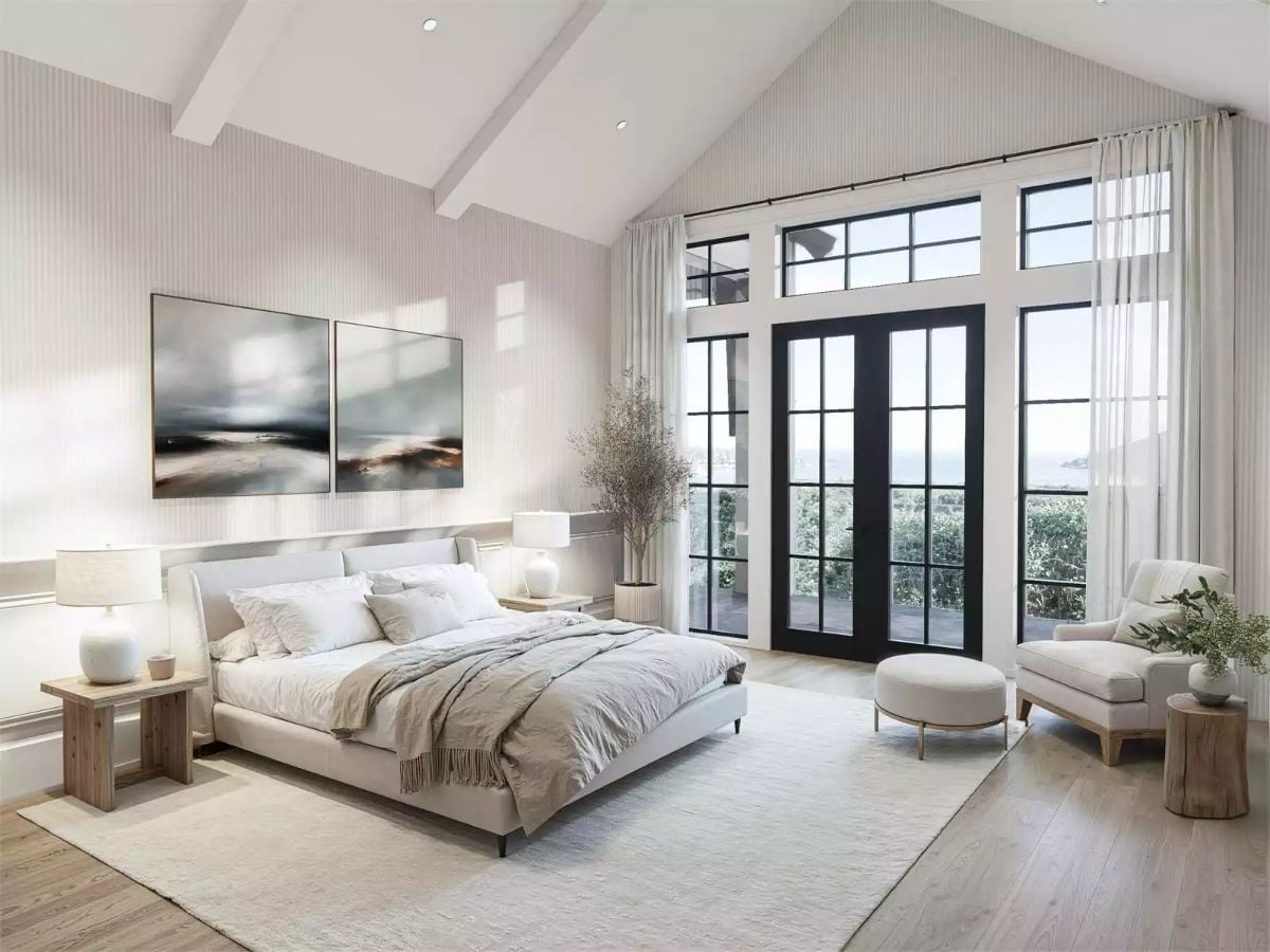 Vaulted Cathedral Ceilings and Steel French Doors Frame a Room Built Around Quiet