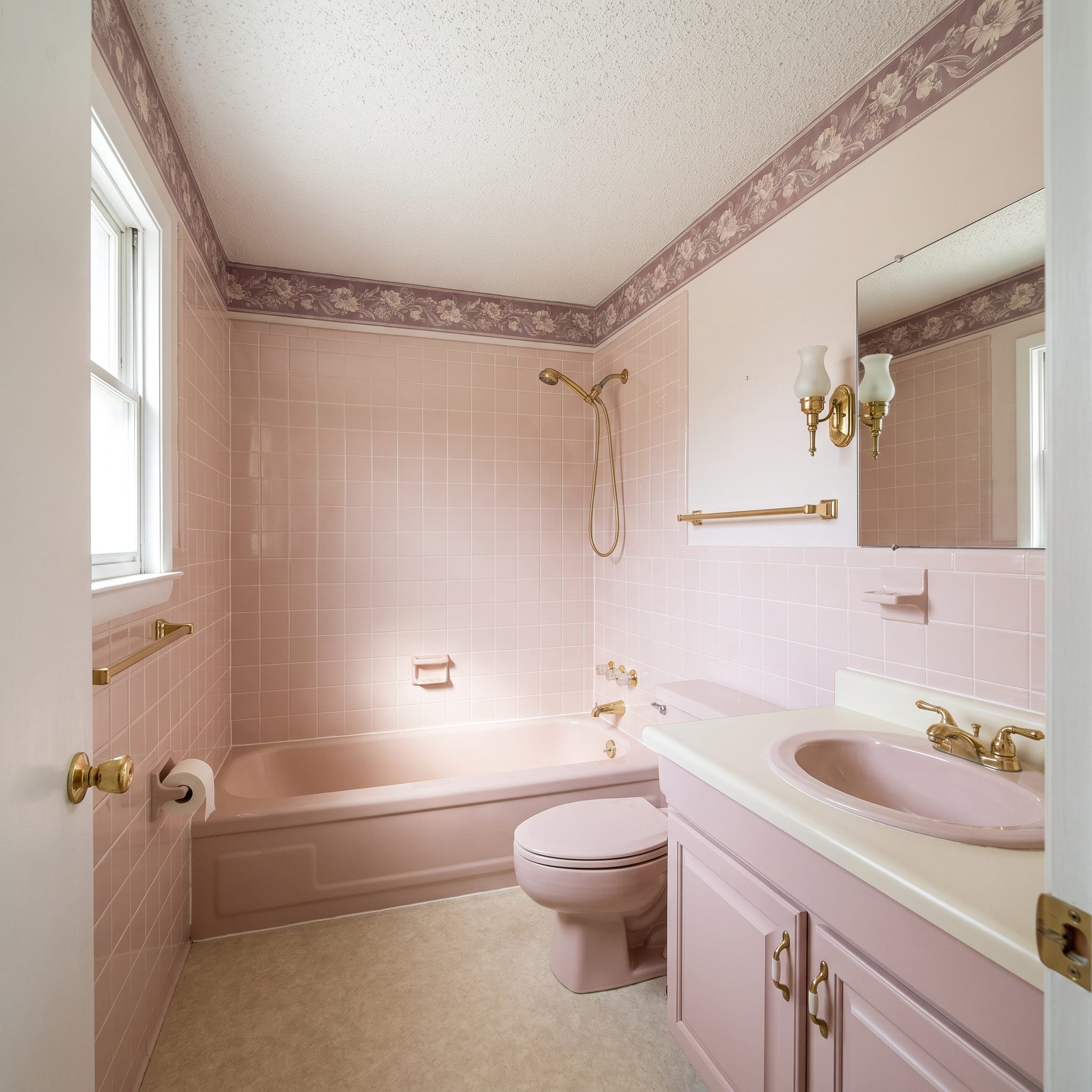 This Pink-Tiled 1980s Bathroom Was Frozen in Time and Begging to Be Rescued — See the 24 Before & After Design Ideas — Before
