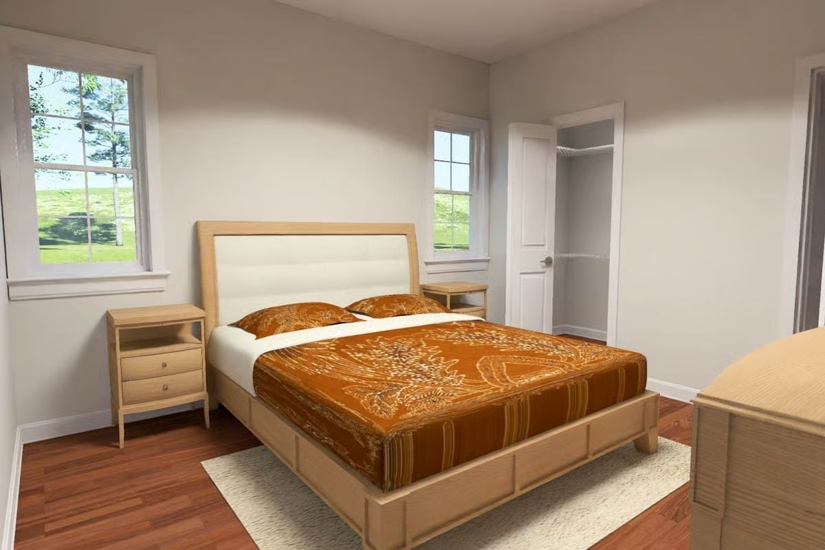 Burnished Orange Bedding Against Pale Wood Keeps This Bedroom Grounded