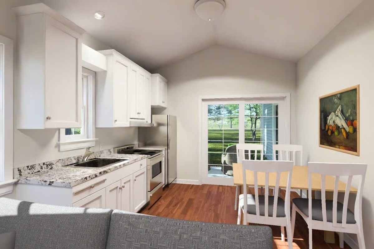 Granite Counters and White Cabinets Keep This Cottage Kitchen Honest