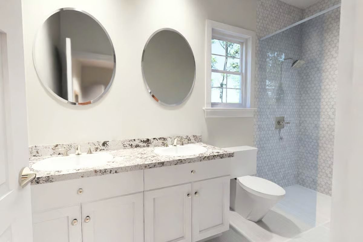 Hex Tile and Granite Make This Cottage Bathroom Work Harder Than Its Size Suggests