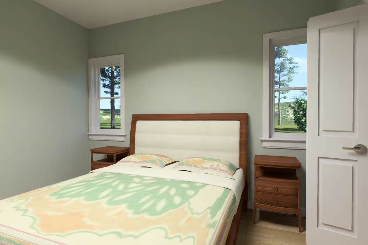 Cherry Wood Nightstands and Sage Walls That Make a Small Room Feel Intentional