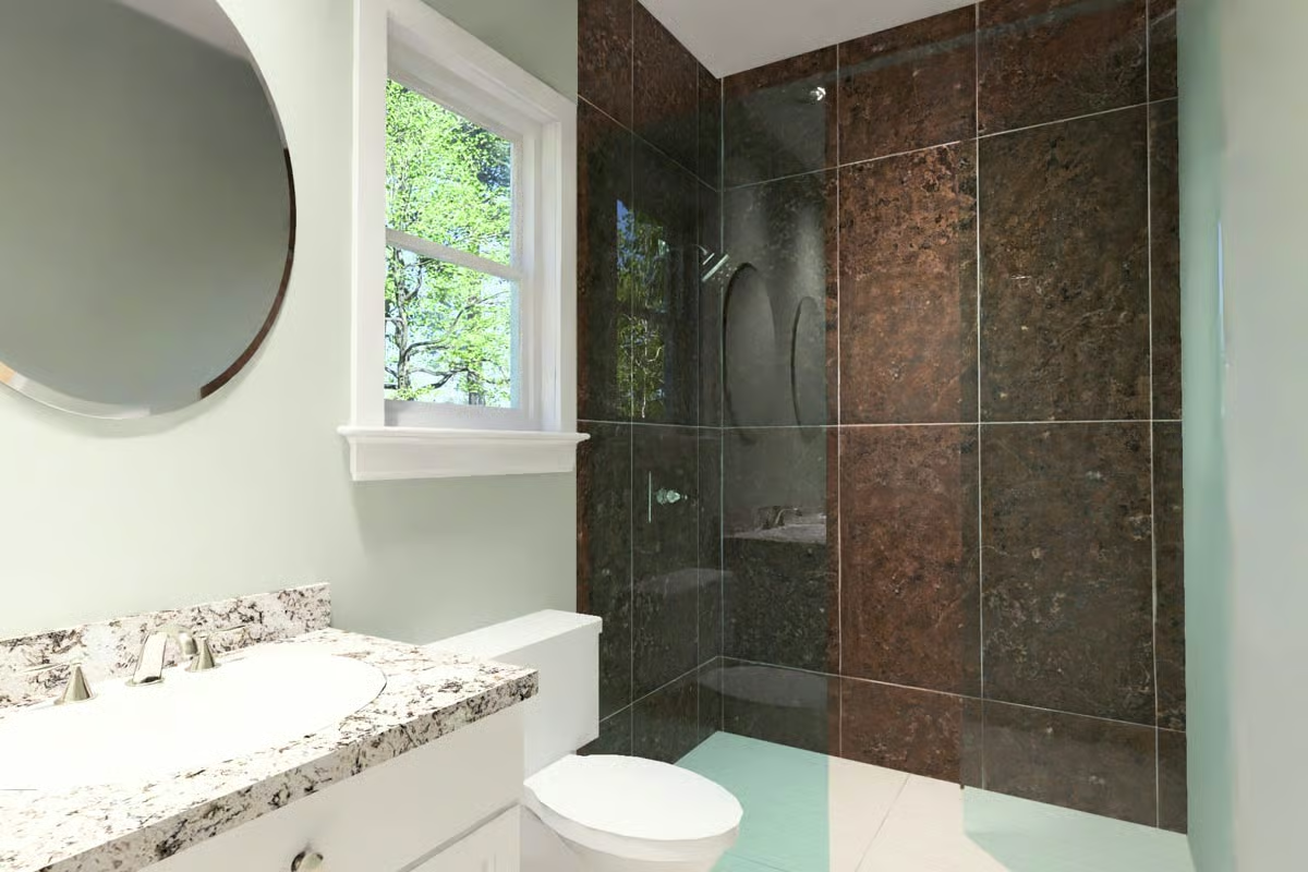 Dark Stone Tile and a Glass Shower That Earn Every Inch of the Space