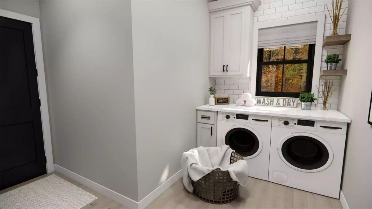 Subway Tile and a Marble Counter Make Laundry Feel Less Like a Chore