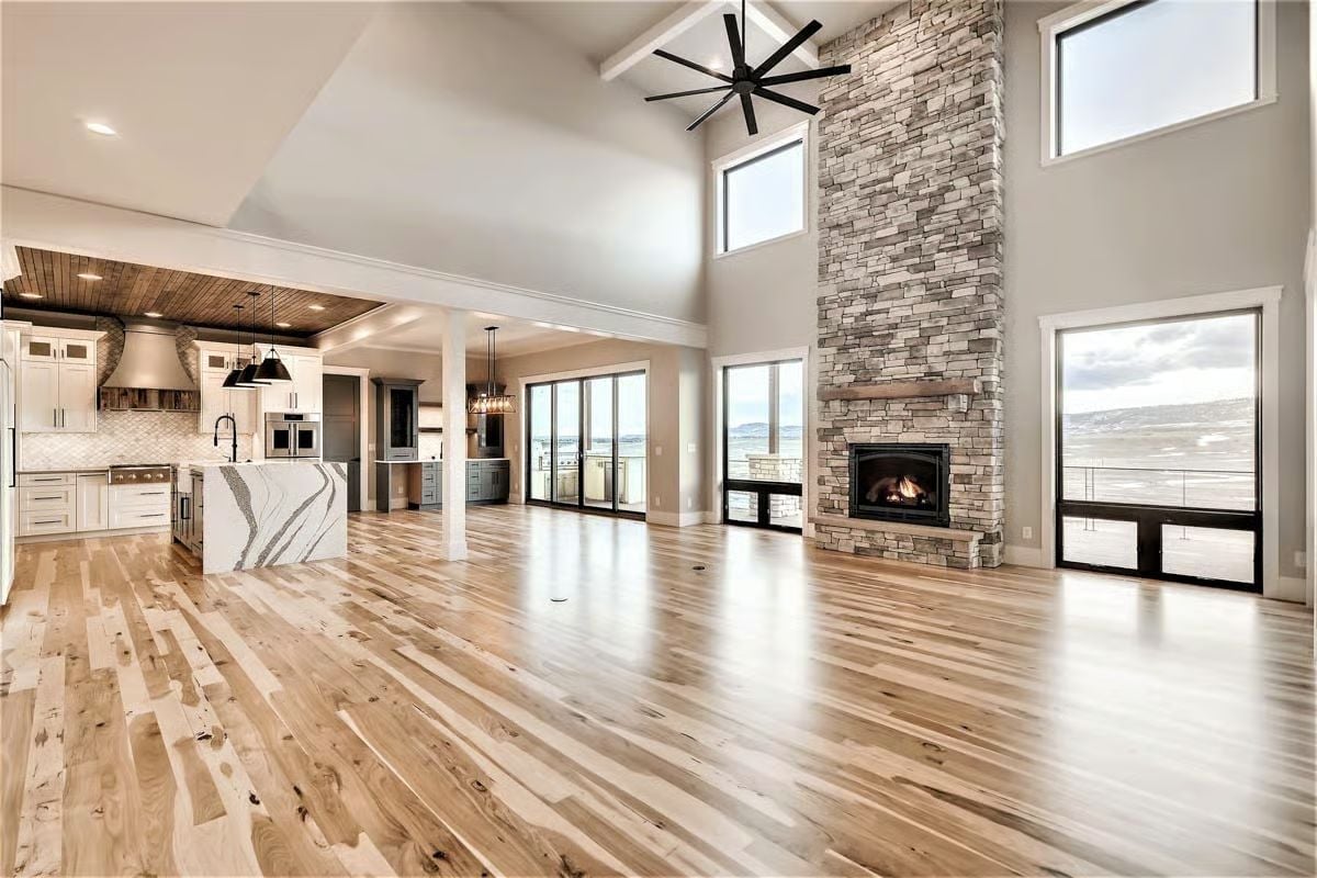 Floor-to-Ceiling Stacked Stone Fireplace Built for a Room This Tall