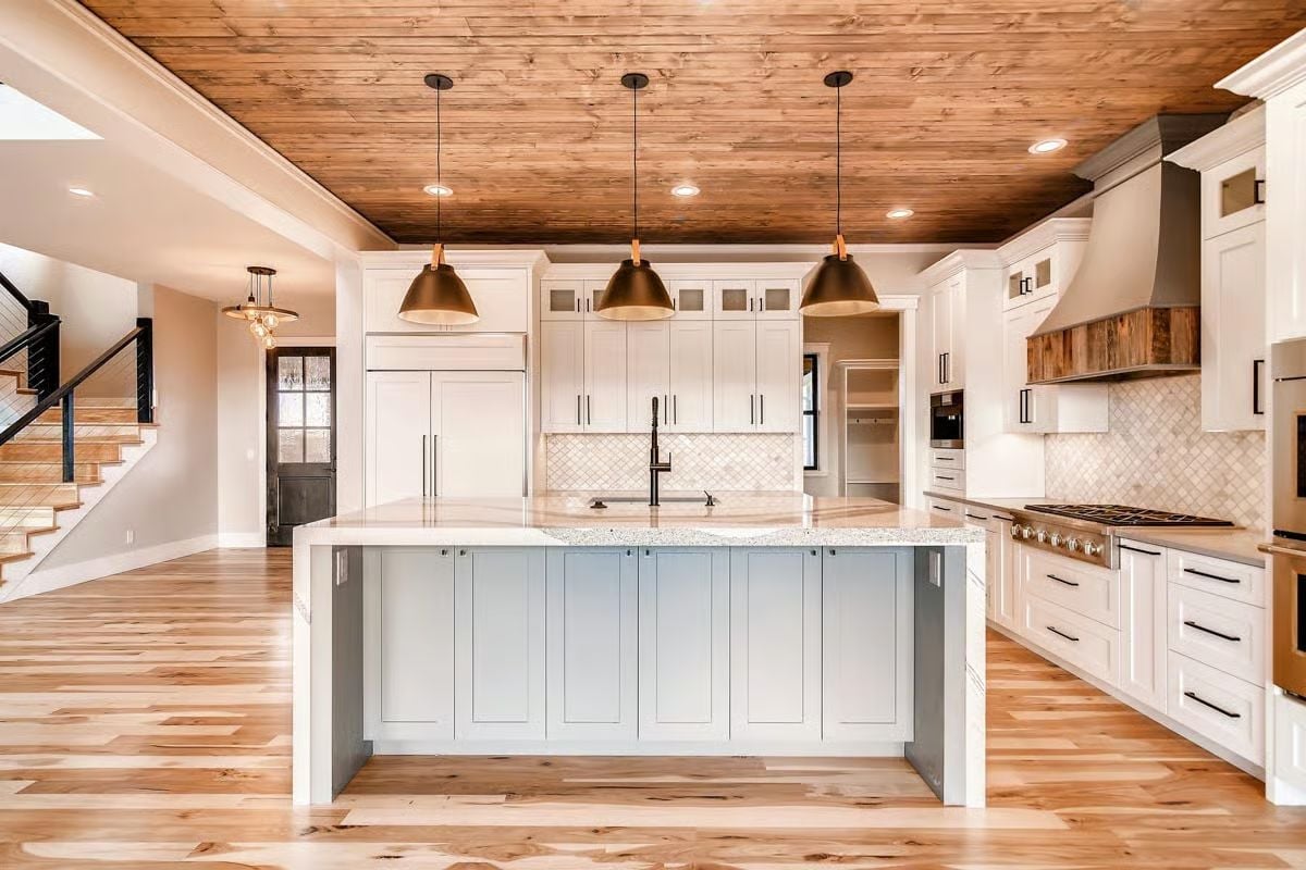Shiplap Ceiling, Black Pendants, and an Island That Earns Its Square Footage