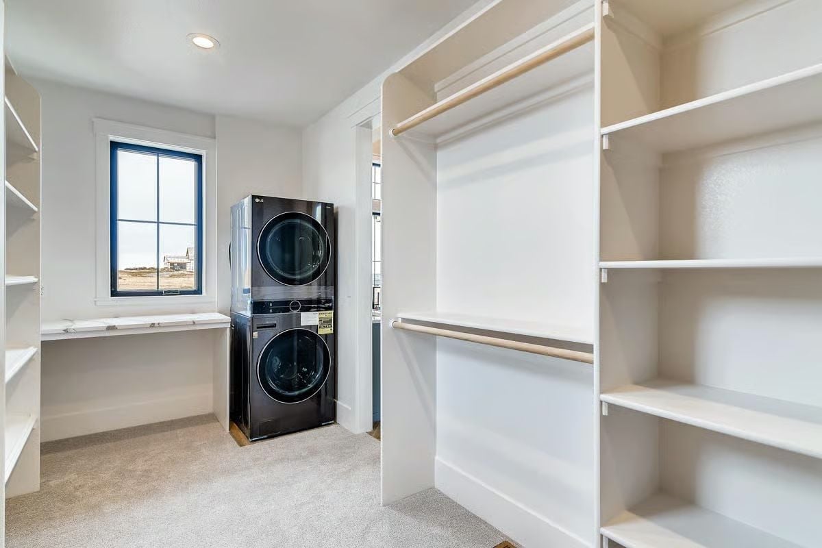 Stacked Washer-Dryer Inside the Walk-In Closet Changes How Laundry Day Works