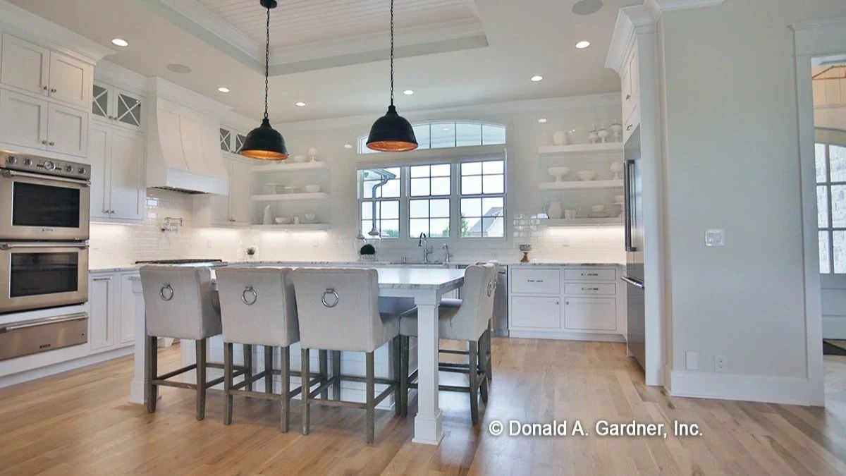 Black Dome Pendants, Ring-Back Stools, and a Kitchen Island Worth Gathering Around