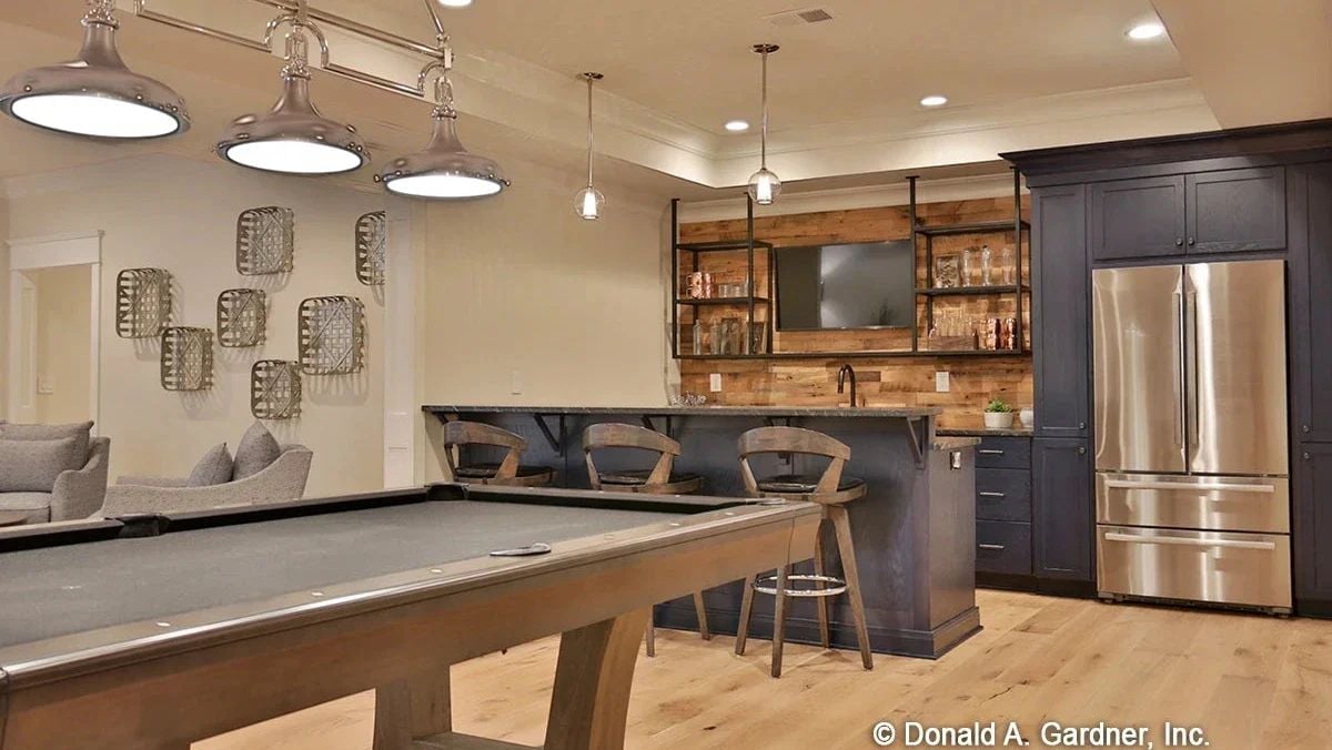 Industrial Pendants, Reclaimed Wood Bar Wall, and a Billiard Room Built for Late Nights