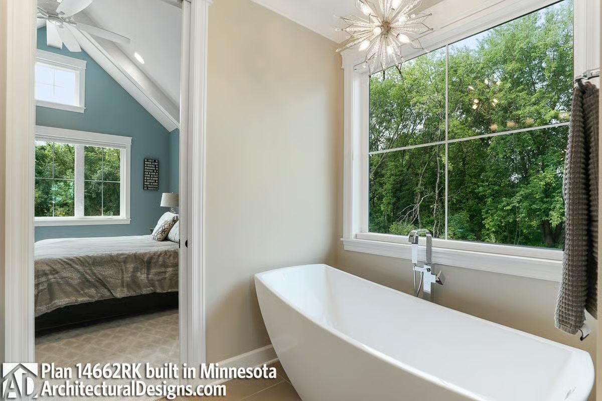 Freestanding Tub Positioned to Watch the Trees Do Their Thing