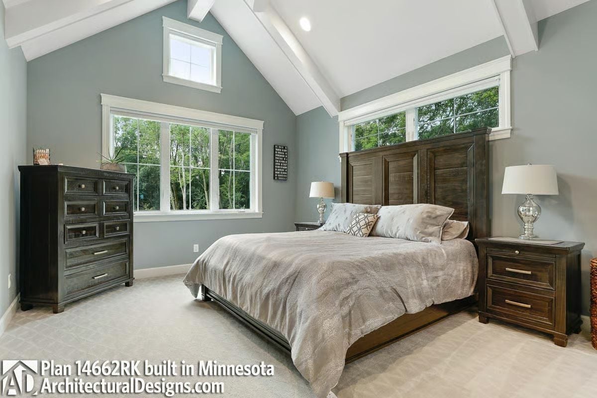 Vaulted Beams and Blue-Gray Walls That Make a Bedroom Feel Like a Retreat