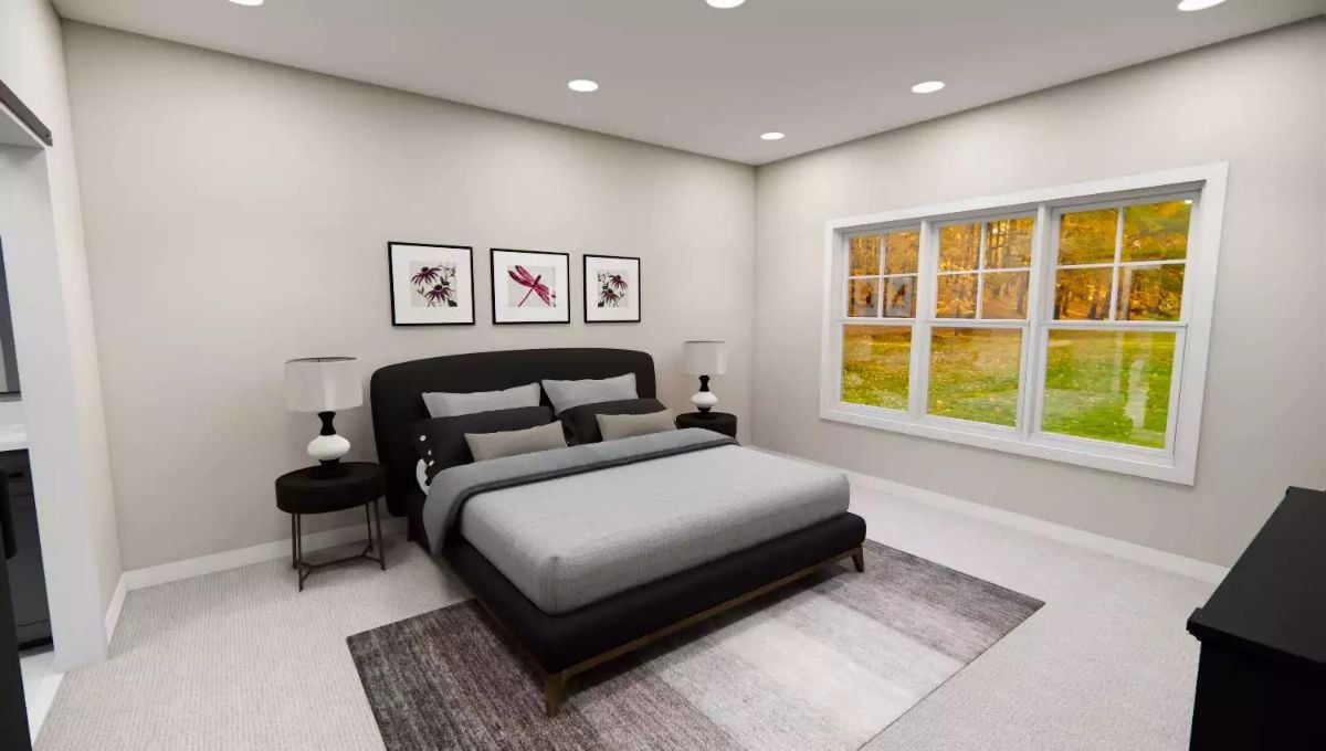 Black Furniture and Gray Bedding Keep This Primary Bedroom Unapologetically Calm