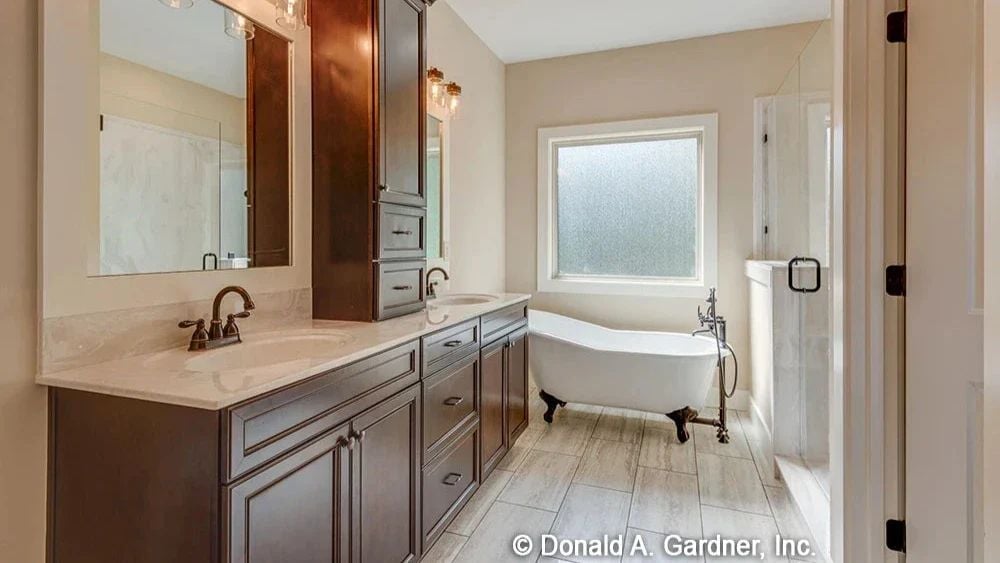 Clawfoot Tub, Dark Cabinetry, and a Window That Keeps Things Private