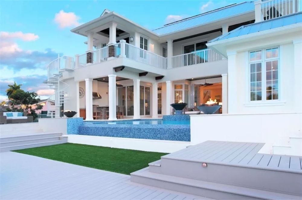 Elevated Pool Deck Where the Fire Bowls Stay Lit After Dark