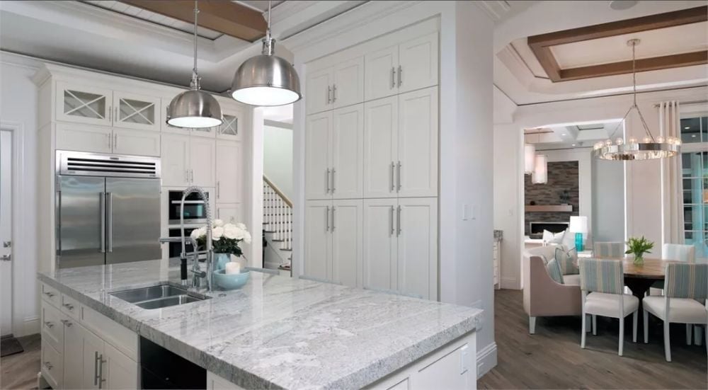 Marble Island, Polished Nickel, and Enough Cabinet Space to Mean It