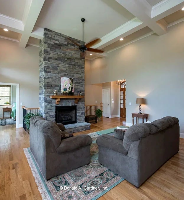 Soaring Stone Fireplace Earns Every Inch of Wall It Takes Up