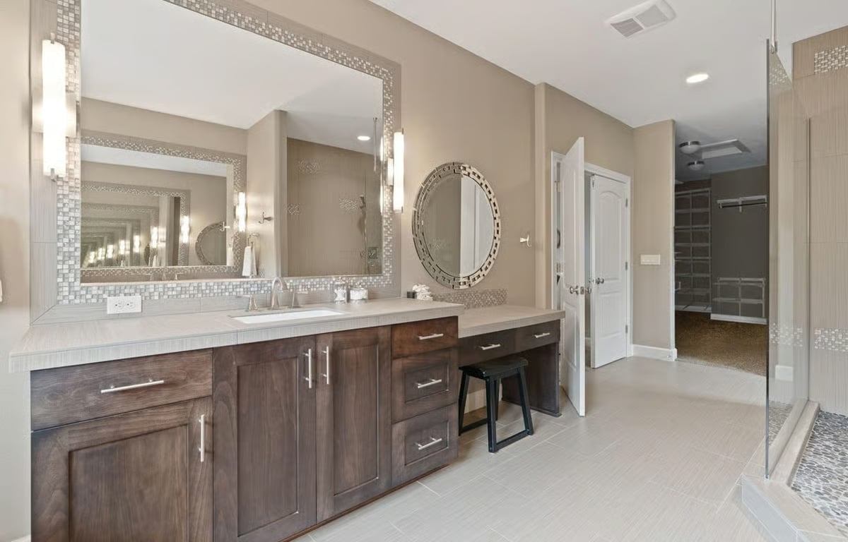 Mosaic-Framed Mirrors and a Built-In Vanity Stool That Make the Routine Feel Less Rushed